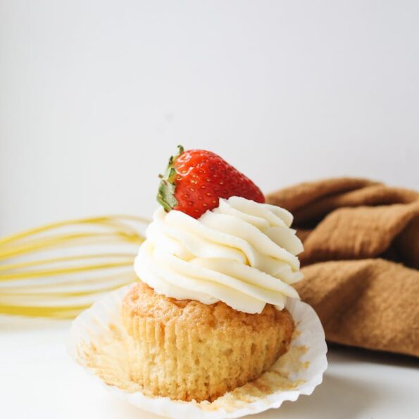 Close-Up Shot of a Cupcake with Strawberry on Top